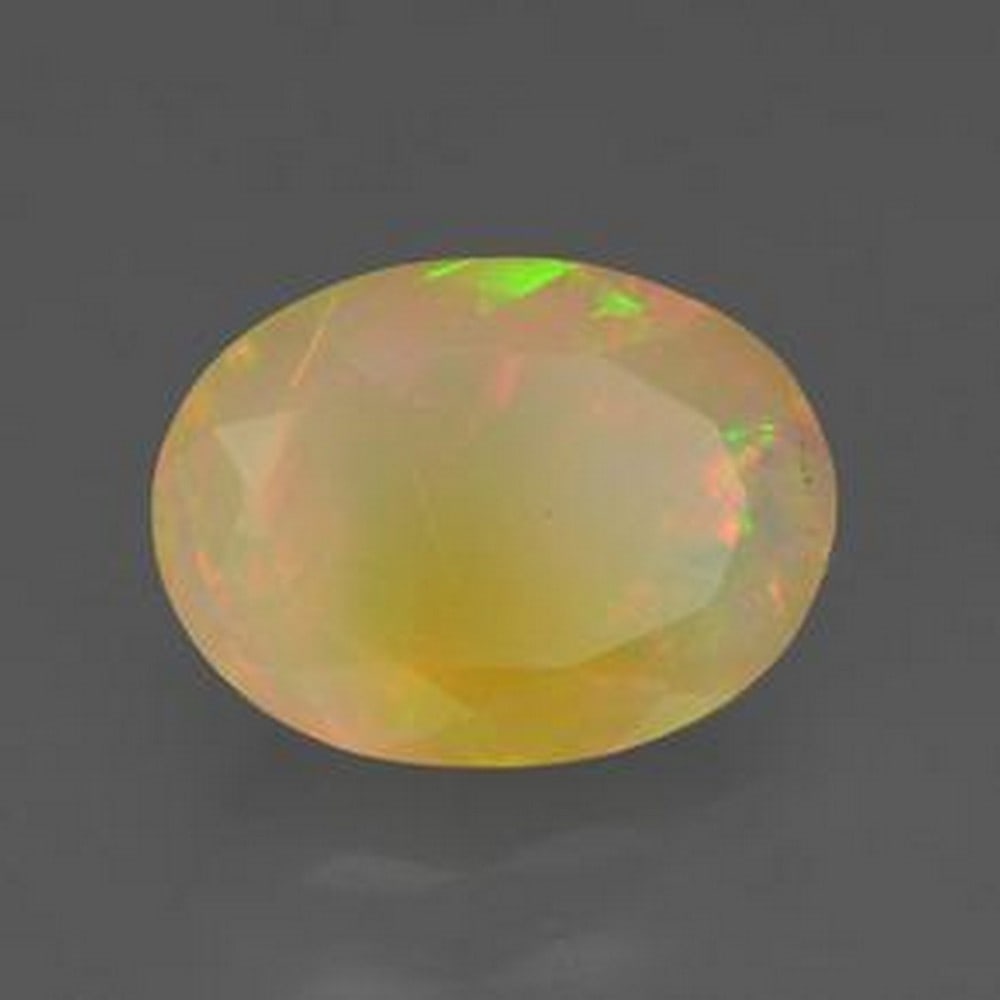 1.8ct Oval Facet "SUNRISE" Opal Gemstone: 1.8ct Oval Facet Opal - Multicolor 1pc Oval Opal, Fire energy stones of ancient wisdom that burn off karma from the past and open the way to rebirth. These stones carry a soul holograph and lend acces