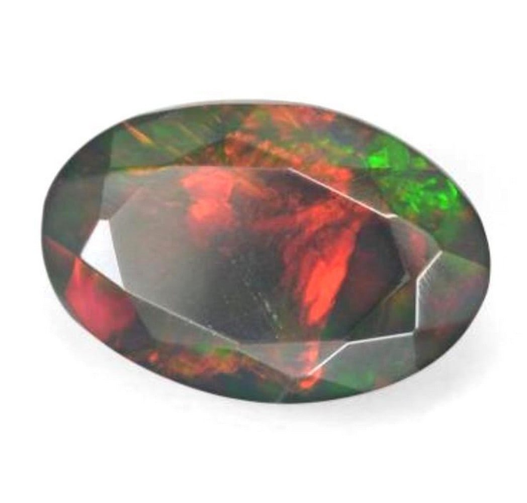 1.84ct Multicolour Oval Opal Gemstone: 1.84ct Multicolour Oval Opal Gemstone Size: 12.04 x 8 x 4.7mm Shape: Oval Facet Colour: Multicolour Clarity: Translucent Treatment: Smoked Origin: Australia Mohs Hardness: 5.5-6.5 View Pho