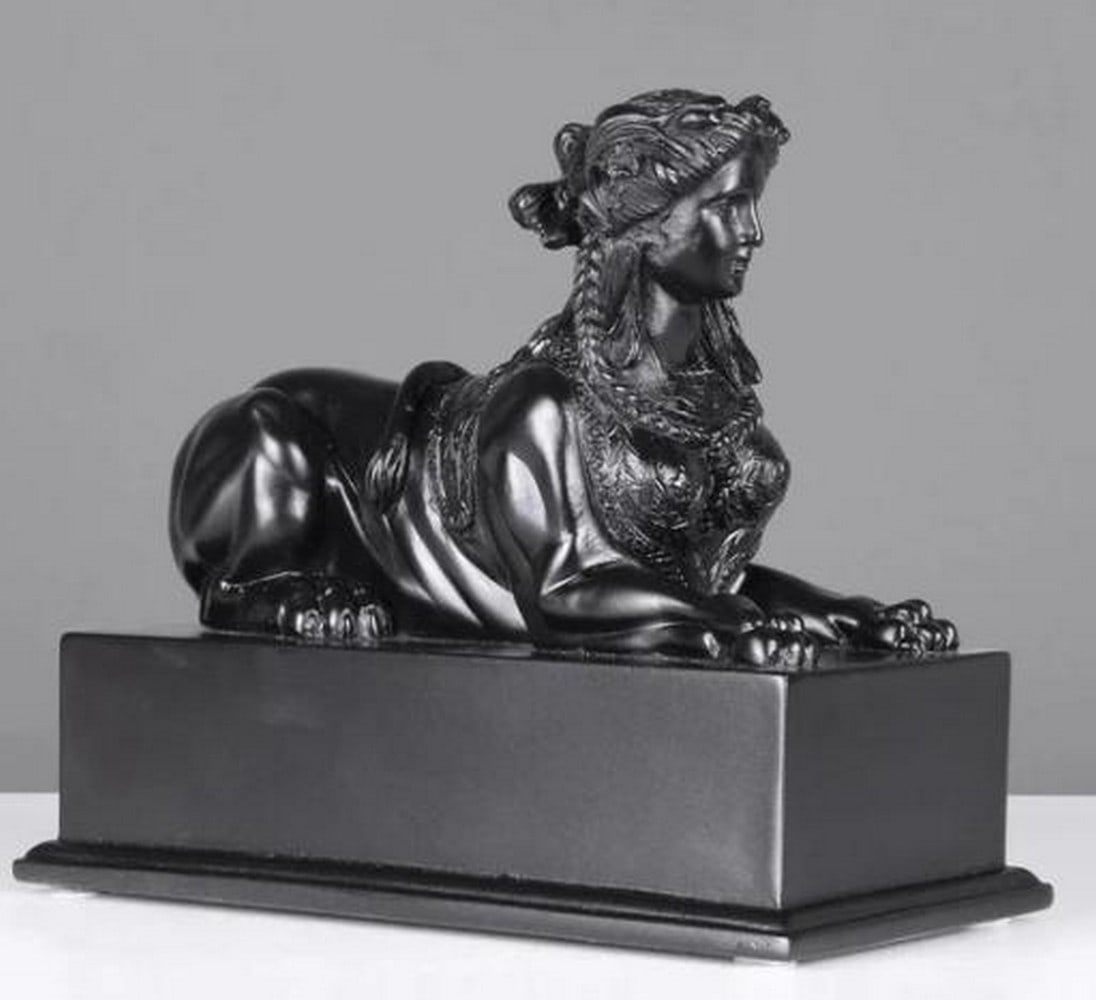 Solid Black Sphinx On Base Carrara Marble Statue: Solid Black Sphinx On Base Carrara Marble Statue. This solid white Carrara marble with a glossy black coating Sphinx statue on a sleek black base exudes timeless elegance. The finely crafted detail