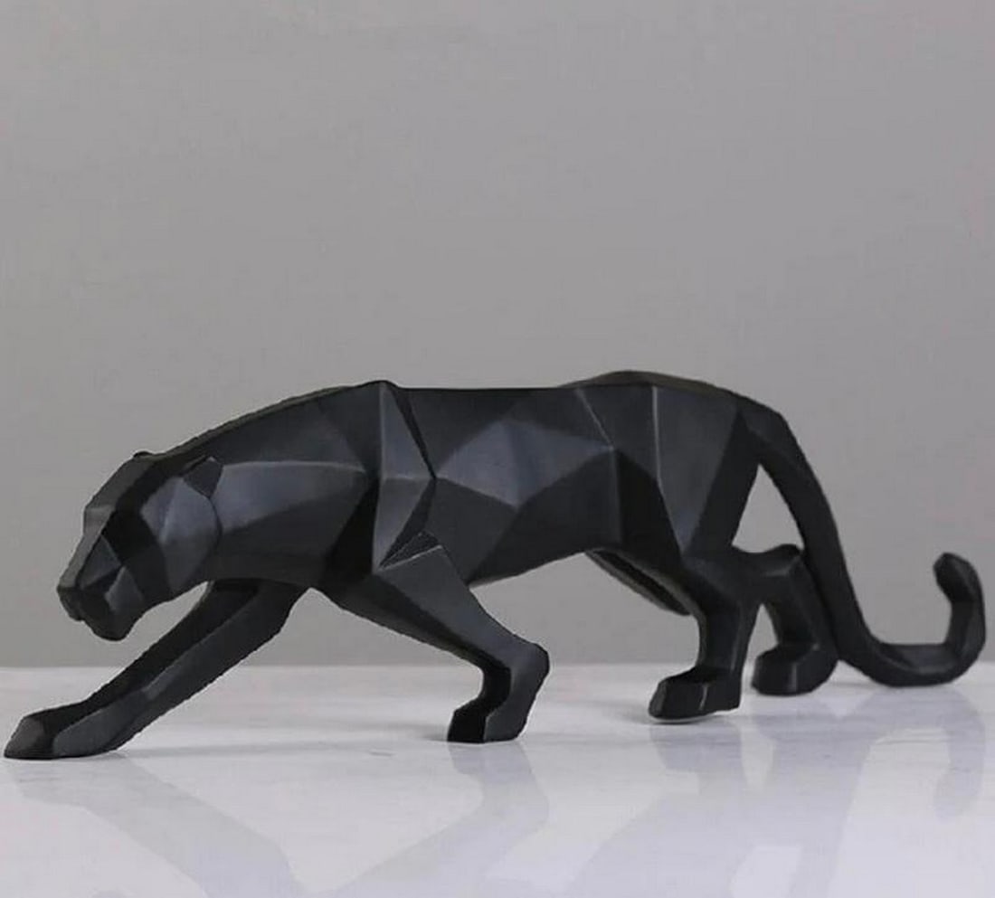 17" - Cryptonic Black Stealth Panther Sculpture: 17" - Cryptonic Black Stealth Panther Sculpture Panther Sculpture will look great in your home or office. A sleek piece of artwork that always wows your guests. Also makes the perfect gift. 
