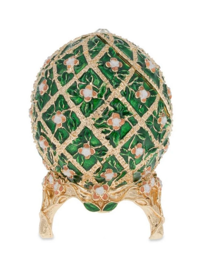 1907 Royal Rose Trellis Russian Inspired Egg: 1907 Royal Rose Trellis Russian Inspired Egg This hand-painted sparkling egg is adorned with a high-polished green enamel with golden trim. It is decorated with light pink enameled roses and green