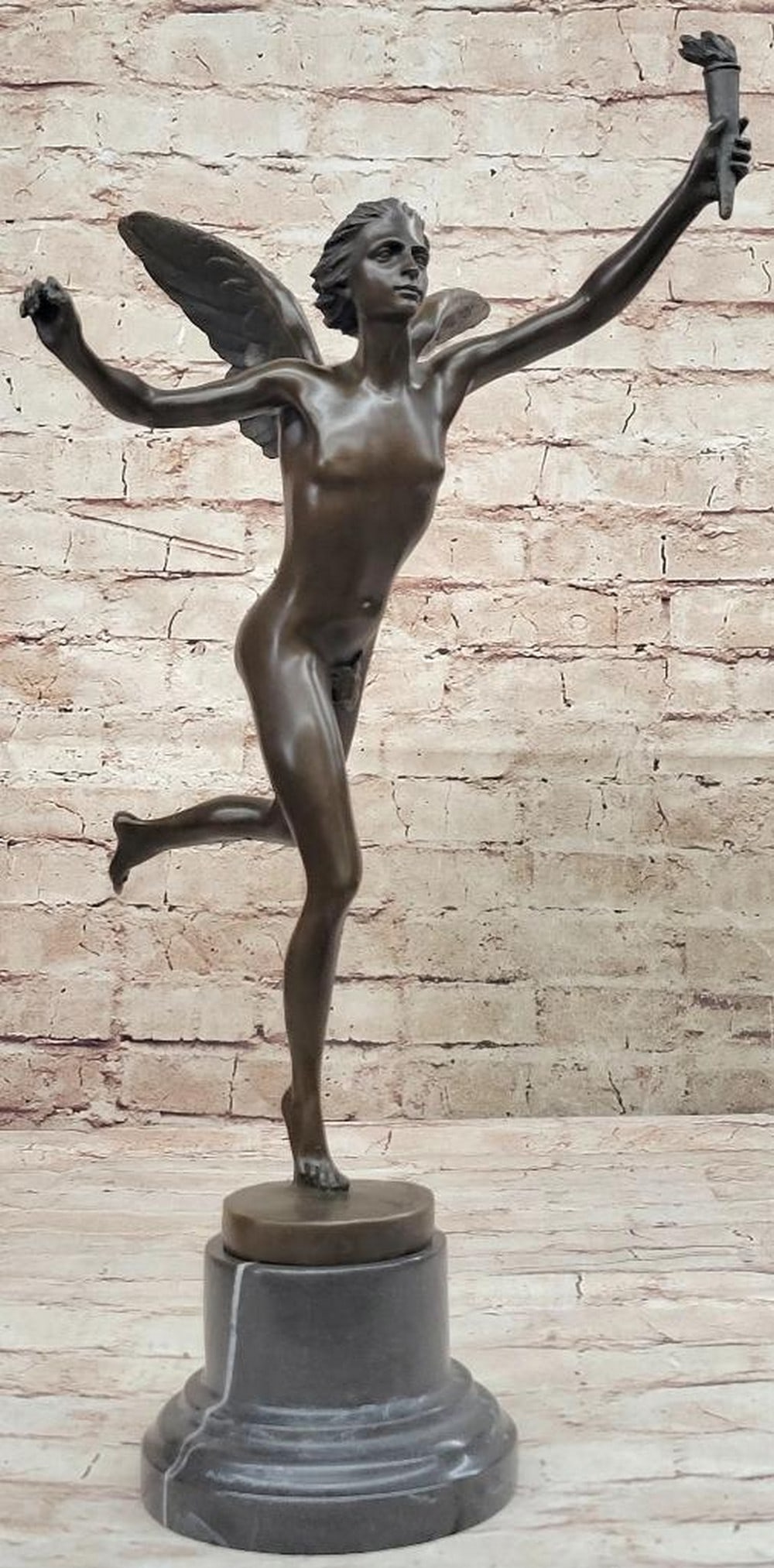 Dumont Inspired Winged Fairy Holding Torch Bronze Sculpture On Marble Base - 17" x 9": Dumont Inspired Winged Fairy Holding Torch Bronze Sculpture - 17" x 9" his beautiful Bronze figure of a fairy, The winged fairy balanced on an orb on an round black marble base and raising a