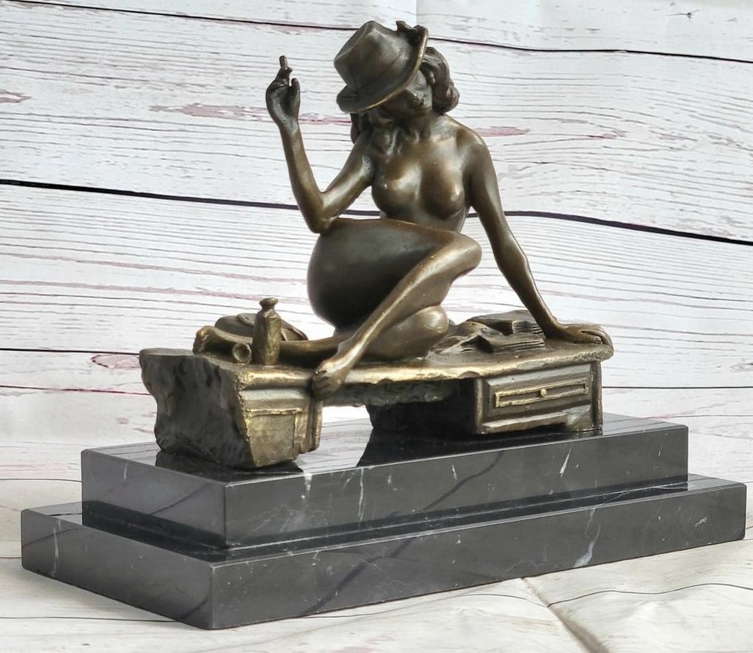 Art Deco Erotic Bronze Sculpture: Art Deco Erotic Bronze Sculpture With style, grace and ease she leans back while she is laying seductively on a bench, wearing her lover`s hat and holding a cigar while tilting her head in a sugg