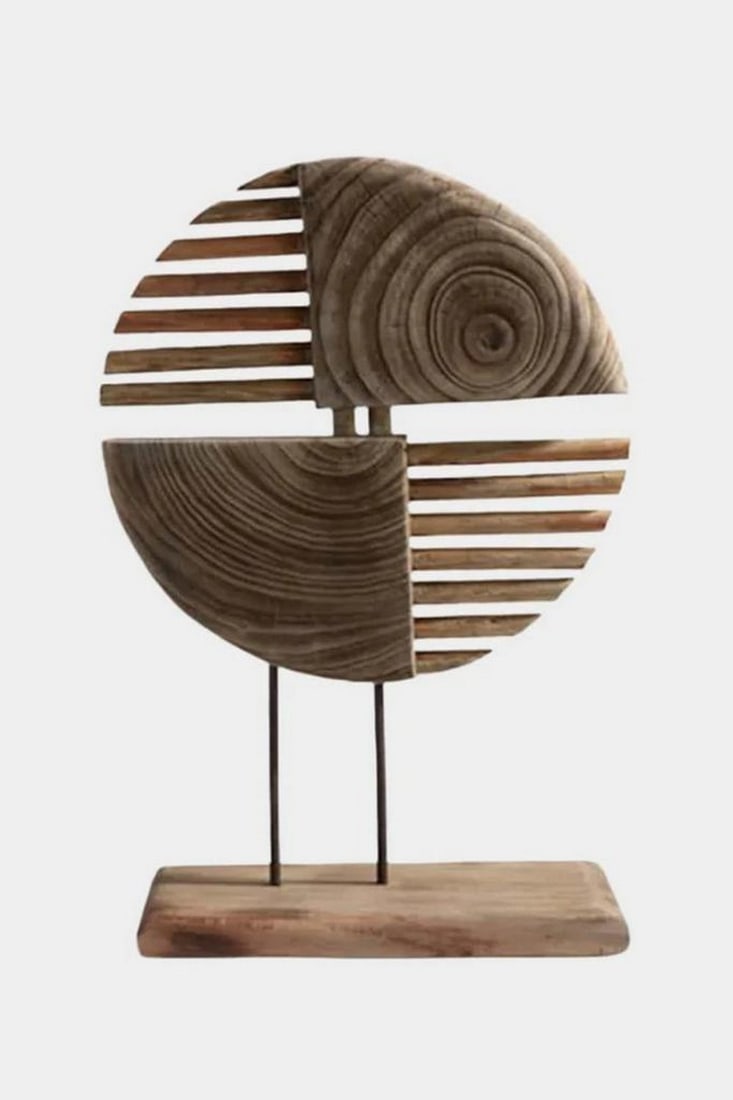Quadrants in Balance Wooden Sculpture: Quadrants in Balance Wooden Sculpture This striking wooden sculpture melds natural texture with geometric harmony. Composed of four segmented quadrants within a circular frame, it plays with contrast