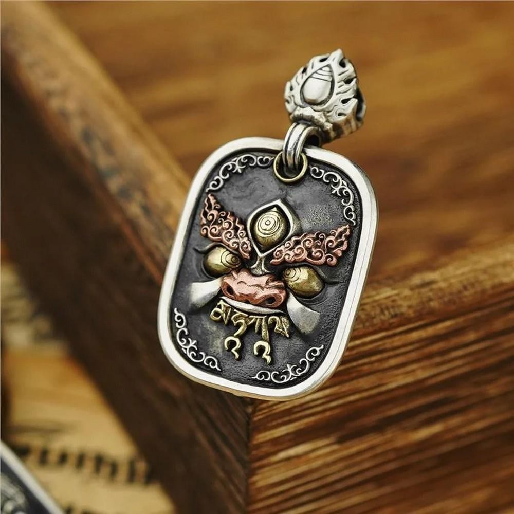 Black God of Fortune Necklace: Black God of Fortune Necklace Handcrafted in Mongolia, the Black God of Fortune Necklace honors a revered deity of wealth and abundance from local folklore. With intricate filigree details and