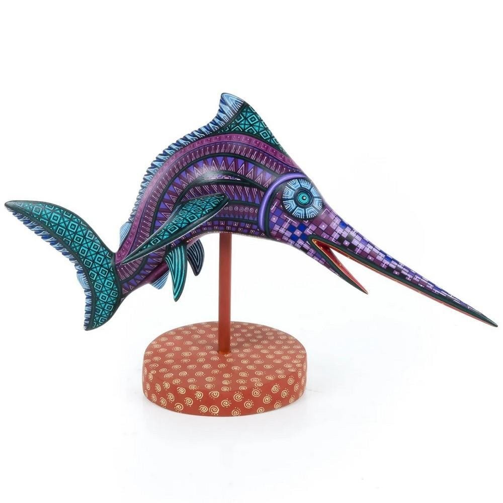 Zapotec Sailfish on Stand – Oaxacan Alebrije by Nicolás Morales: Zapotec Sailfish on Stand – Oaxacan Alebrije by Nicolás Morales Graceful and bold, this captivating sailfish alebrije springs to life from the hands of master carver Nicolás Morales and the brilli