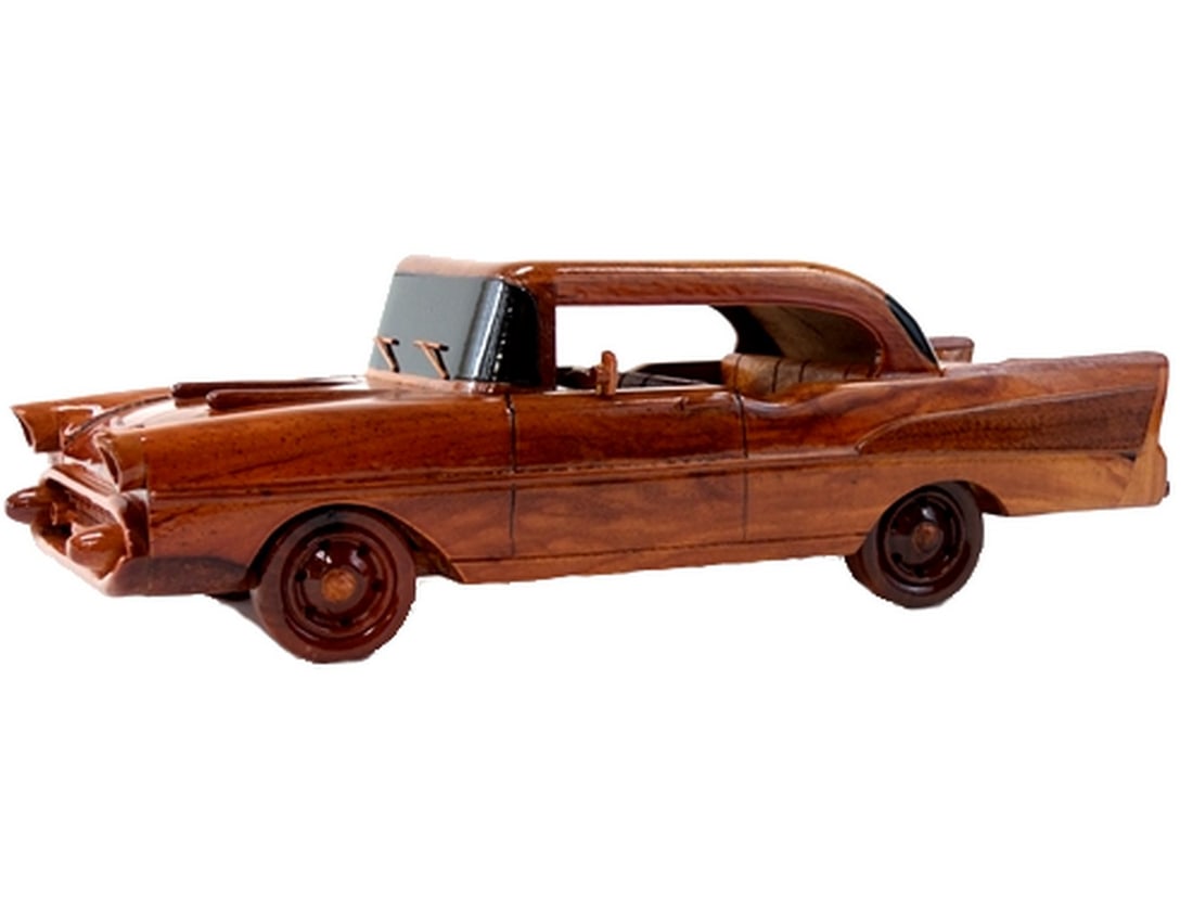 1957 Chevy Belair: 1957 Chevy Belair The 1970 Chevy Belair is beautifully recreated in this handcrafted scale model. Made of solid mahogany and finely detailed, this classic car in a clear polyurethane high gloss