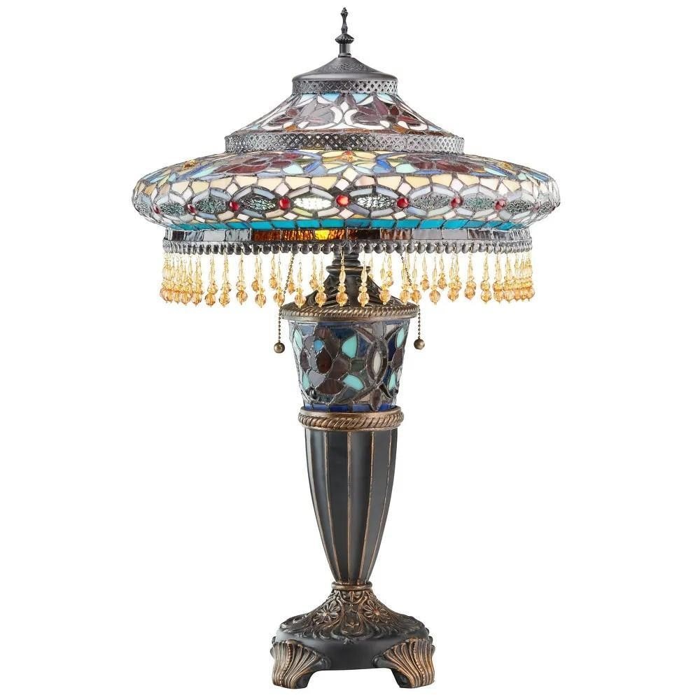 Multicolored Stained Glass Table Lamp: Multicolored Stained Glass Table Lamp Illuminate your home with the timeless artistry of this striking table lamp. Its bell-shaped shade is handcrafted from 1,199 pieces of stained glass in rich hues