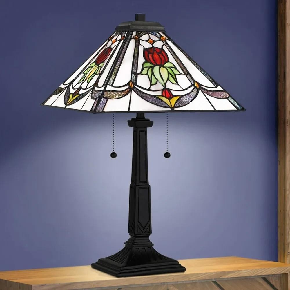 Twilight Mosaic Tiffany Table Lamp: Twilight Mosaic Tiffany Table Lamp Hand-crafted in the classic Tiffany style, this 24-inch table lamp features a stained glass shade in warm, mosaic tones and a mahogany bronze pedestal base. It acco