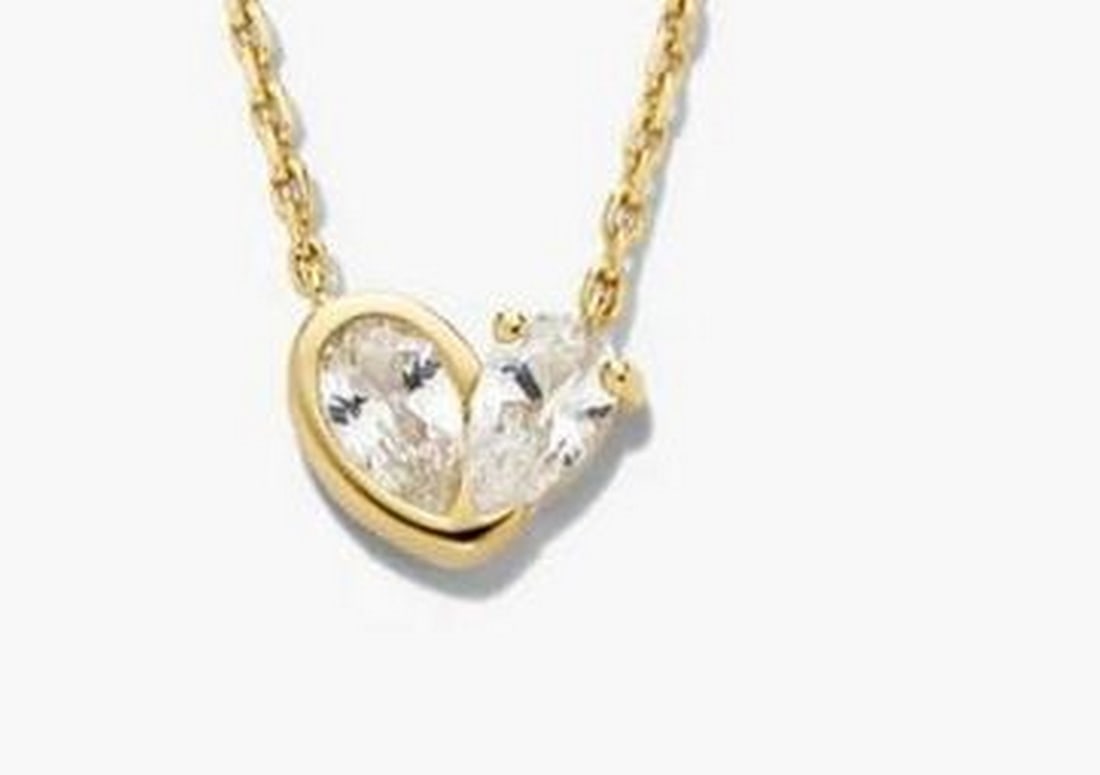 Two of Hearts Necklace in 18k Gold Vermeil with Lab Grown White Sapphire: Two of Hearts Necklace in 18k Gold Vermeil with Lab Grown White Sapphire This necklace features a heart-shaped pendant set with lab grown white sapphires in a half-bezel, half-prong design. The pendan