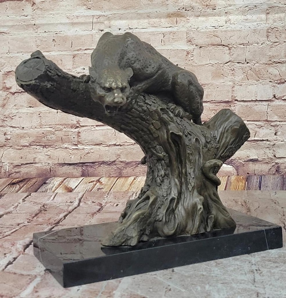 Leopard on Tree Original Bronze Sculpture by Milo – 13" x 17": Leopard on Tree Original Bronze Sculpture by Milo – 13" x 17" This original bronze sculpture by Milo depicts a leopard perched on a weathered tree, claws gripping the bark and tail wrapped