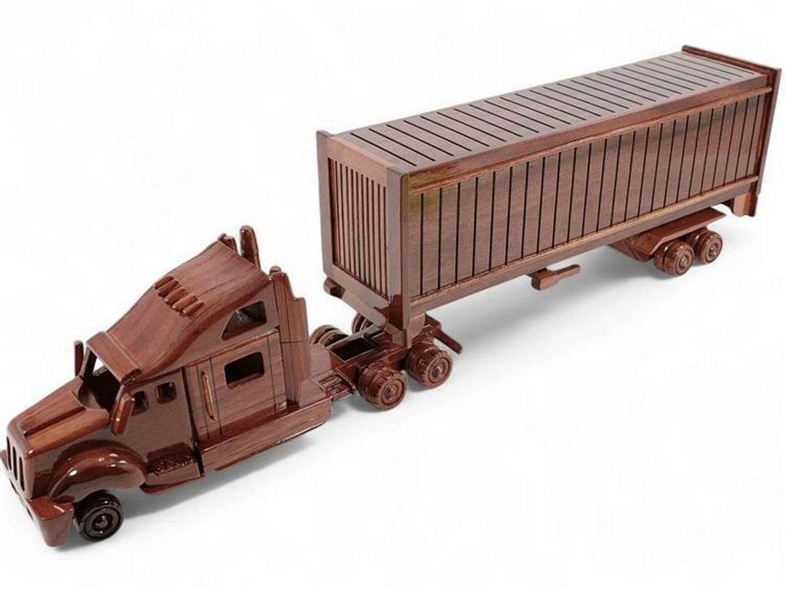 Wood Semi Truck and Trailer Model: Wood Semi Truck and Trailer Model This handcrafted semi truck and trailer model is made from mahogany wood, showcasing detailed craftsmanship and classic design. Perfect for collectors or as a