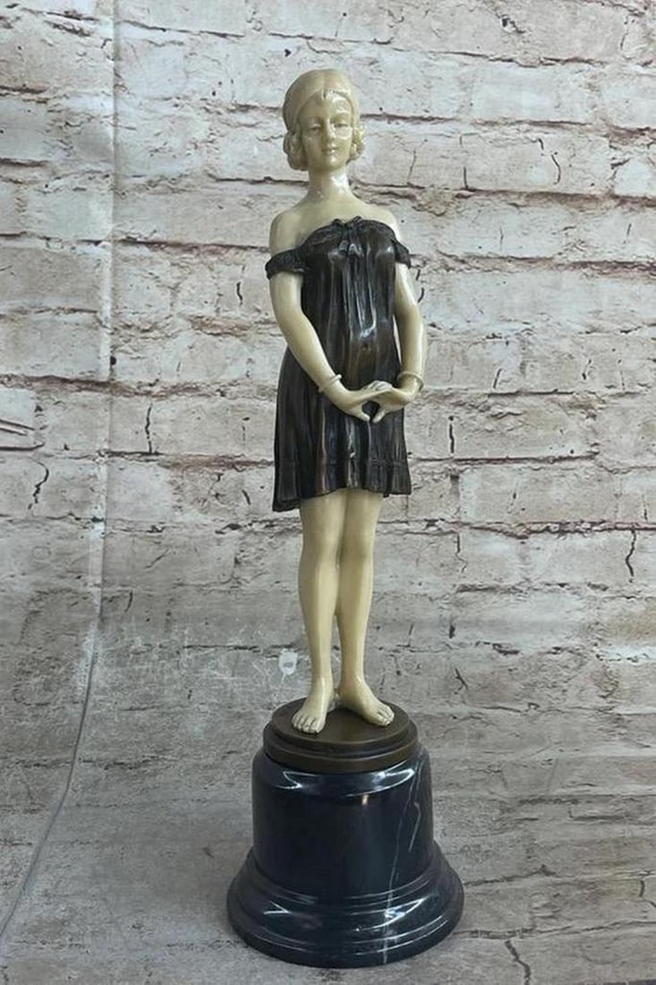 Posing Victorian Girl Inspired Bronze Statue - 13.5" x 4": Posing Victorian Girl Inspired Bronze Statue - 13.5" x 4" This timeless bronze statue, crafted through the traditional Lost Wax Casting Process, captures the grace and precision of a beauti