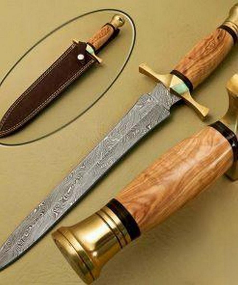 The Spartans Damascus Dagger: Custom Handmade Damascus Steel Dagger Hunting Dagger Knife Handle Olive Wood with Brass Spacer Damascus Steel Blade with 256 Layers on it. HARDNESS 56-60 H R C VERY HIGH QUALITY GENUINE LEATHER SHEATH