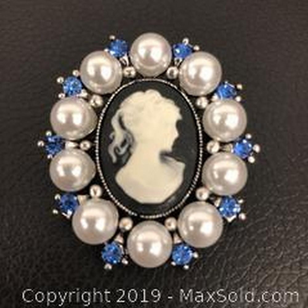 Blue Rhinestone And White Pearl Cameo Broach: Blue Rhinestone And White Pearl Cameo Broach Featuring A Silhouette Of A Beauty. View Photos For Details.