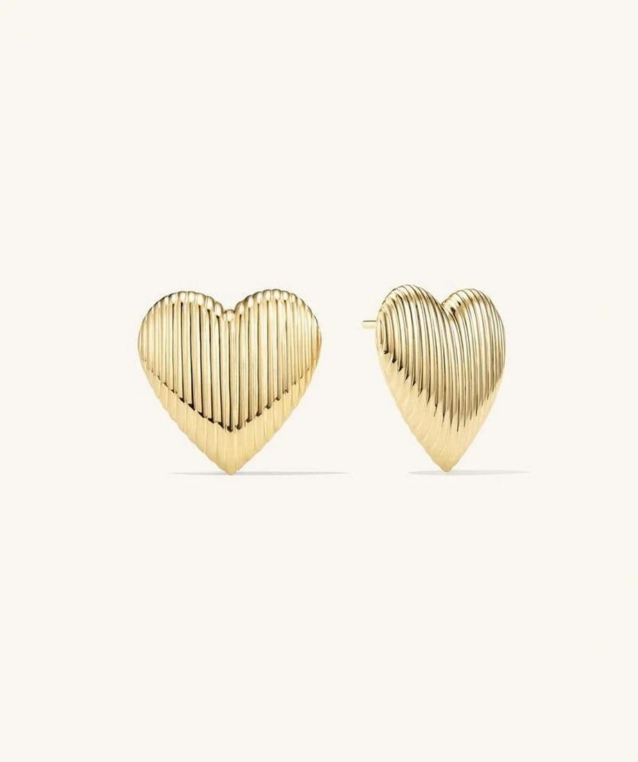 Heart Stud Earrings: Heart stud earrings made from Gold Vermeil. Add a touch of romance to your style with these earrings. Crafted with a radiant gold finish, their delicate heart design exudes charm and timeless elegance