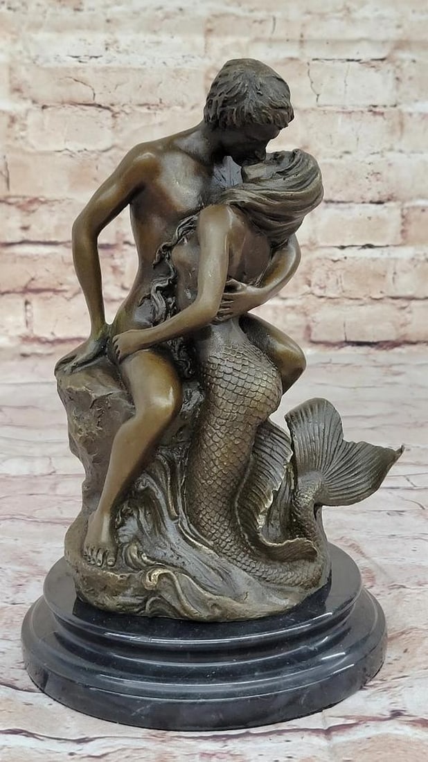 Enchanted Lovers Bronze Sculpture with Marble Base - 10" x 6": Enchanted Lovers Bronze Sculpture with Marble Base - 10" x 6" This captivating bronze sculpture depicts the tender yet forbidden love between a mermaid and a mortal man, entwined in a passiona