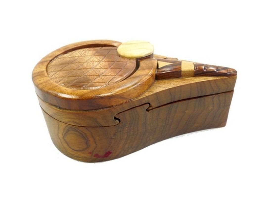 Mahogany Tennis Keepsake Box: Mahogany Tennis Keepsake Box This keepsake box is hand-carved from mahogany wood and features a tennis-themed design on the exterior, with a red velvet-lined interior for storing small items. The box