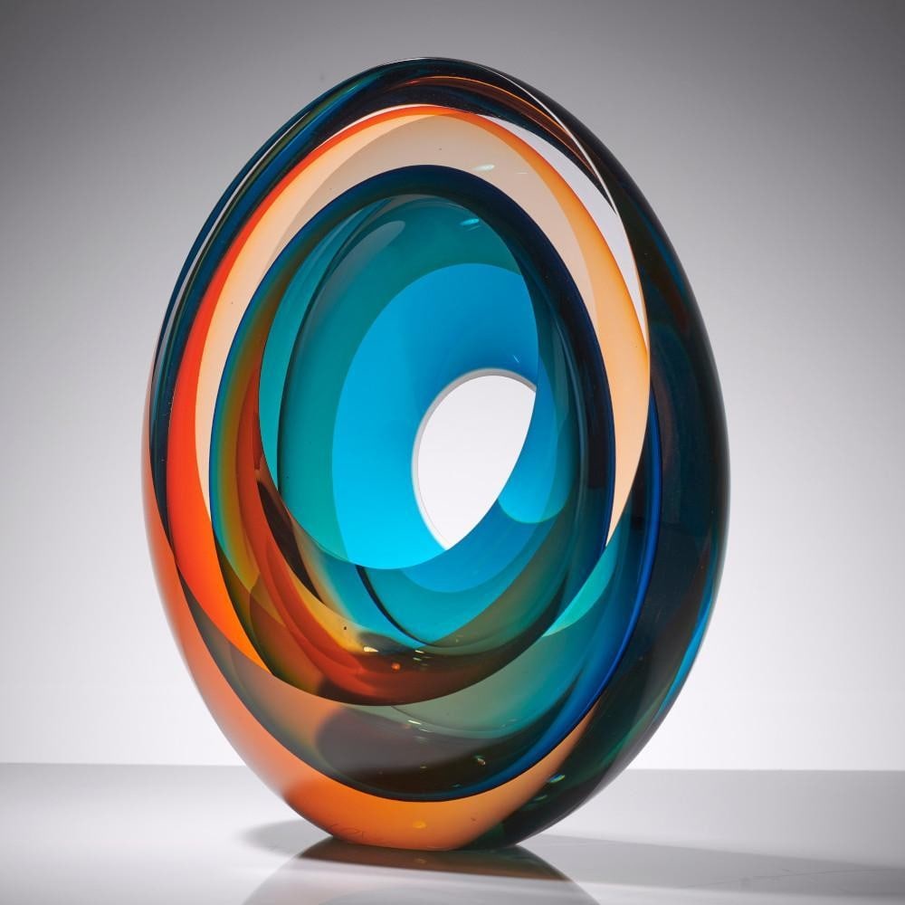 ‘Echoes of Light Oval’ Blown Art Glass Sculpture by Tim Rawlinson: ‘Echoes of Light Oval’ Blown Art Glass Sculpture by Tim Rawlinson This free-blown art glass sculpture by Tim Rawlinson features a refined oval form with cut and polished surfaces that enhance ligh