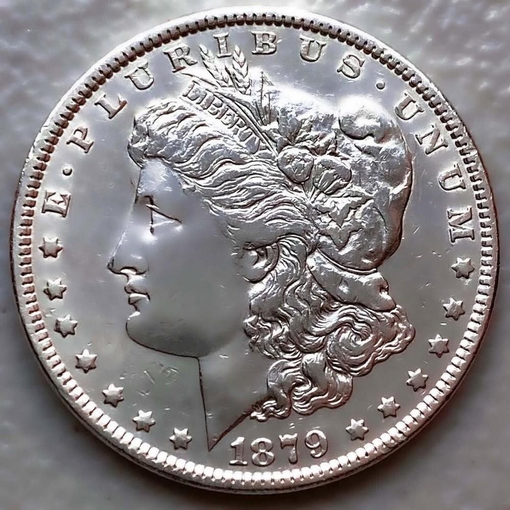1879 AU/UNC MORGAN SILVER DOLLAR: 1879 AU/UNC MORGAN SILVER DOLLAR Certification: Uncertified Circulated/Uncirculated: Uncirculated Year: 1879 Composition: 900 Silver Mint Location: Philadelphia Denominati