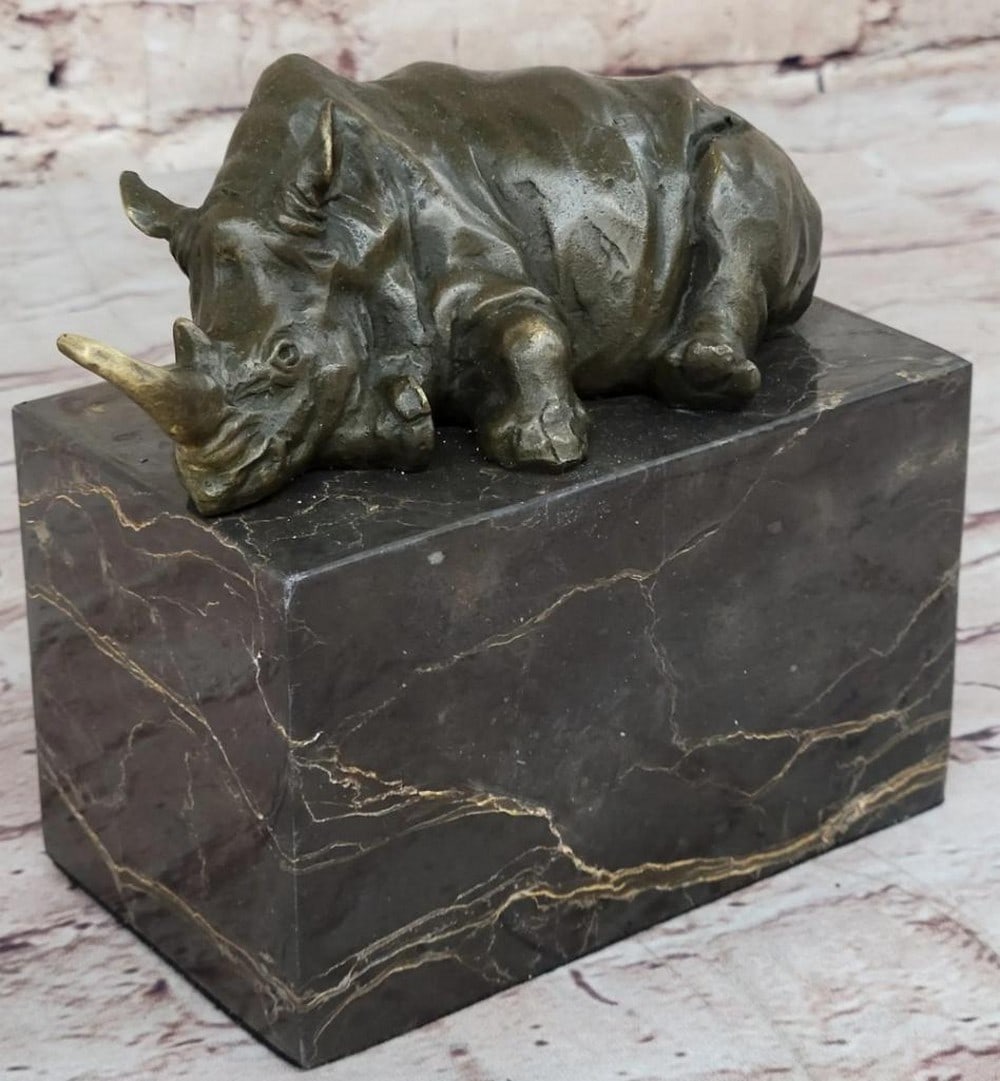 Sleepy Rhino Bookend Original Bronze Sculpture Signed by Milo - 5.5" x 6": Sleepy Rhino Bookend Original Bronze Sculpture Signed by Milo - 5.5" x 6" This striking bronze sculpture by Milo masterfully captures the essence of a sleepy rhinoceros, showcasing its distin
