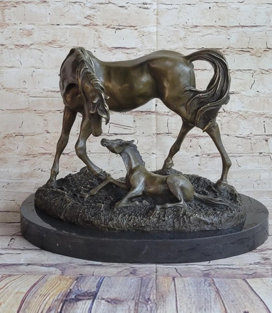 Mare & Foal Bronze Sculpture: Mare & Foal Bronze Sculpture The mother mare, though legs wobbling, excitedly bends her neck down to touch nose`s with her newborn creation. The young foal lays with sprawled legs that eventu