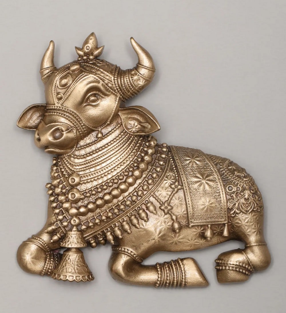 Nandi’s Grace Brass Brooch: Nandi’s Grace Brass Brooch This exquisite brass piece is more than just jewelry; it's a symbol of faith, strength, and devotion, inspired by the sacred Nandi, a revered figure in Hindu