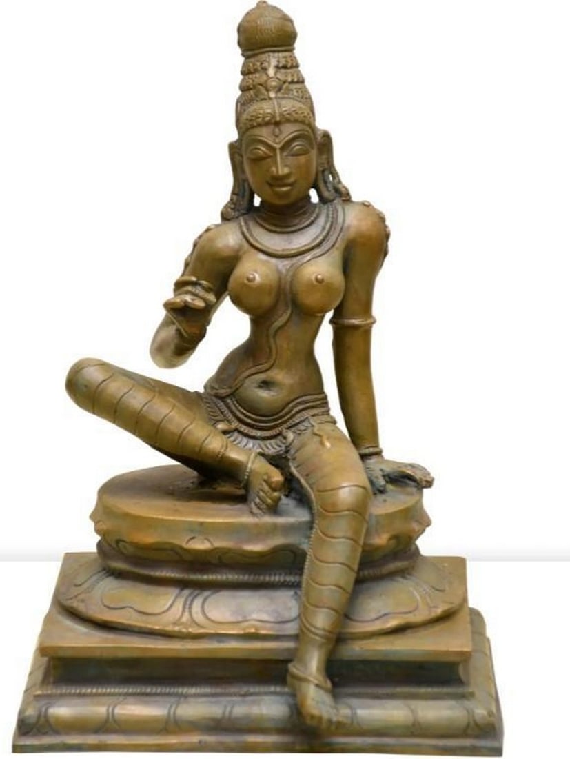 Sitting Devi Uma Panchaloha Bronze: Sitting Devi Uma Panchaloha Bronze This exquisite Panchaloha bronze sculpture features Devi Uma, the embodiment of grace, power, and compassion. Crafted from a sacred blend of five metals, the statue