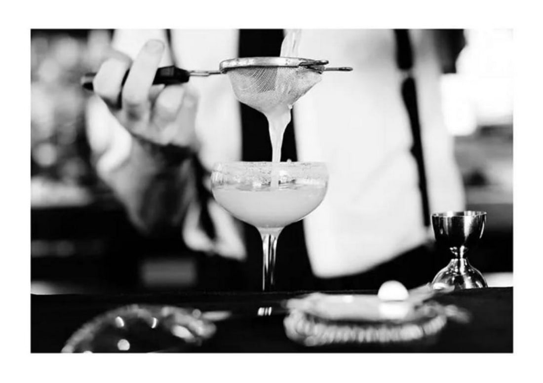 Bartender Pouring Beverage Poster: Bartender Pouring Beverage Poster The poster is printed with a white margin around the image. Frame Not Included. Dimensions: 50cm x 70cm View Photos For Further Details