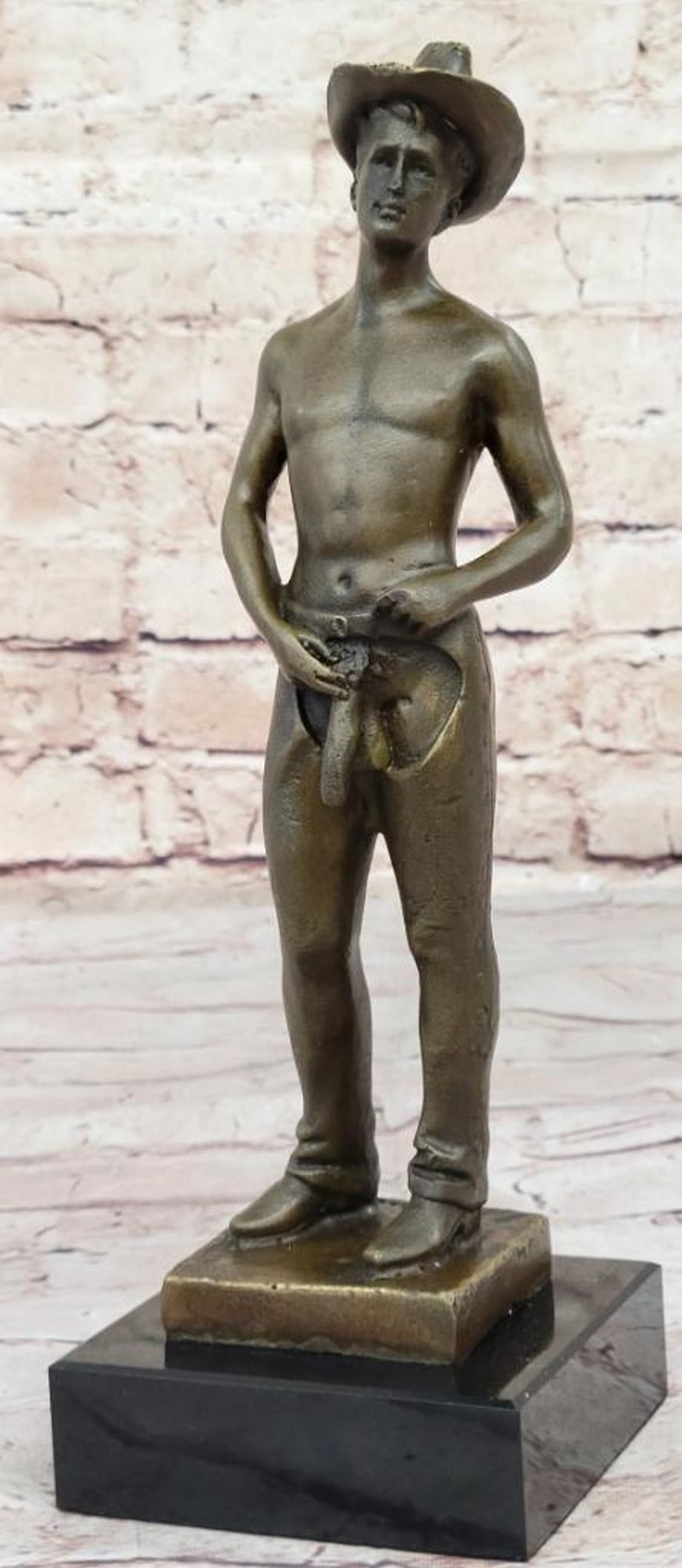 Rebel Cowboy Original Bronze Sculpture by Jean Patoue - 11" x 4": Rebel Cowboy Original Bronze Sculpture by Jean Patoue - 11" x 4" Bold and daring, this striking bronze sculpture by Jean Patoue captures the mischievous spirit of a carefree cowboy. With a co