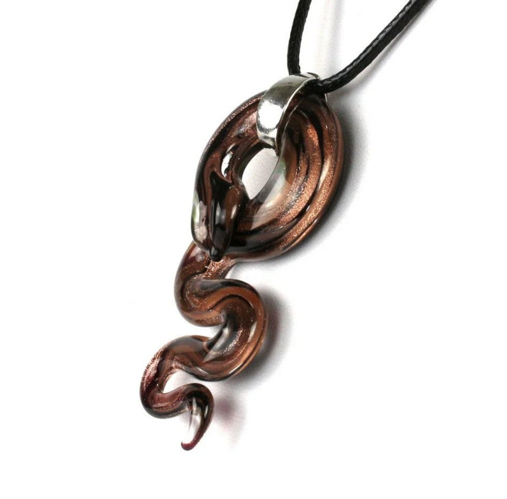 Black Snake Venetian Glass Pendant Necklace: Black Snake Venetian Glass Pendant Necklace Handcrafted glass pendant featuring avventurina decoration, adding elegance and a touch of luxury to the necklace. The rich colors and striking textures are