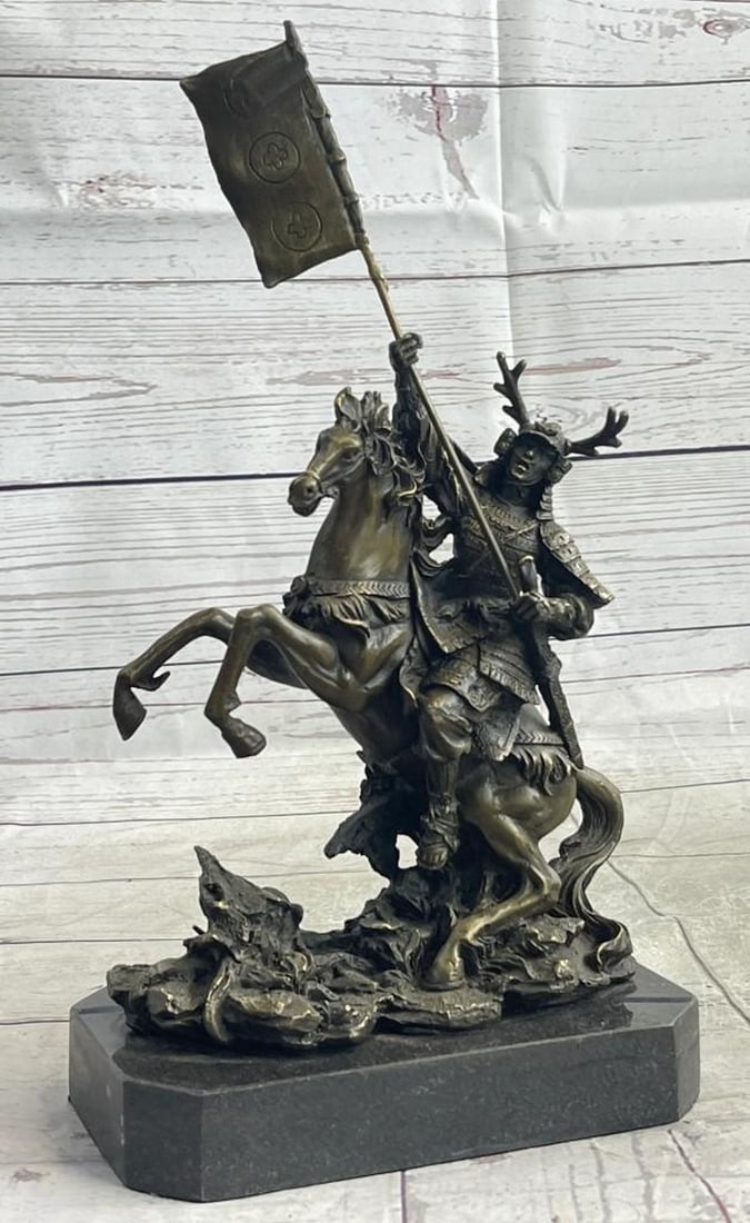The Warrior's Charge Bronze Sculpture: The Warrior's Charge Bronze Sculpture This striking bronze sculpture captures the fierce spirit of a Japanese samurai warrior astride a powerful horse, charging into battle. Clad in intricate arm