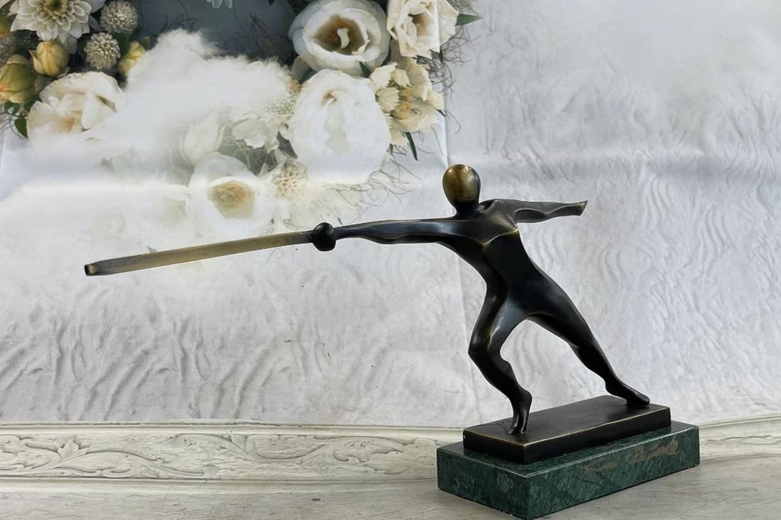 Lunging Fencer Signed Original Bronze Sculpture - 8" x 13": Lunging Fencer Signed Original Bronze Sculpture - 8" x 13" This sculpture shows a fencer who is very focused to achieve his victory over his opponent. The fencer stands with his épée facing