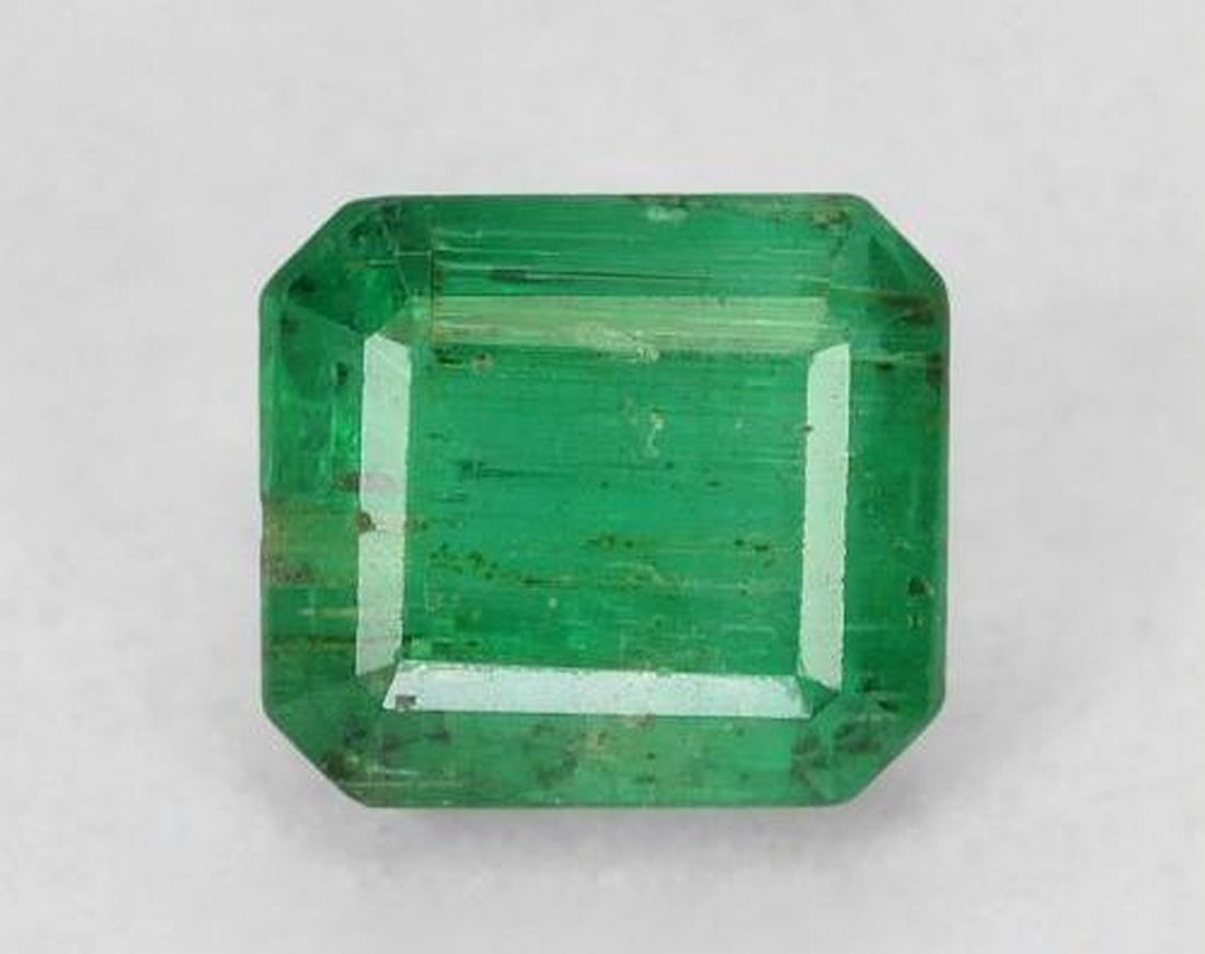 0.77ct Octagon Cut Natural Medium Green Emerald Gemstone: 0.77ct Octagon Cut Natural Medium Green Emerald Gemstone This 0.77ct natural emerald from Colombia features a classic octagon step cut and a balanced medium green hue. With slight inclusions typical