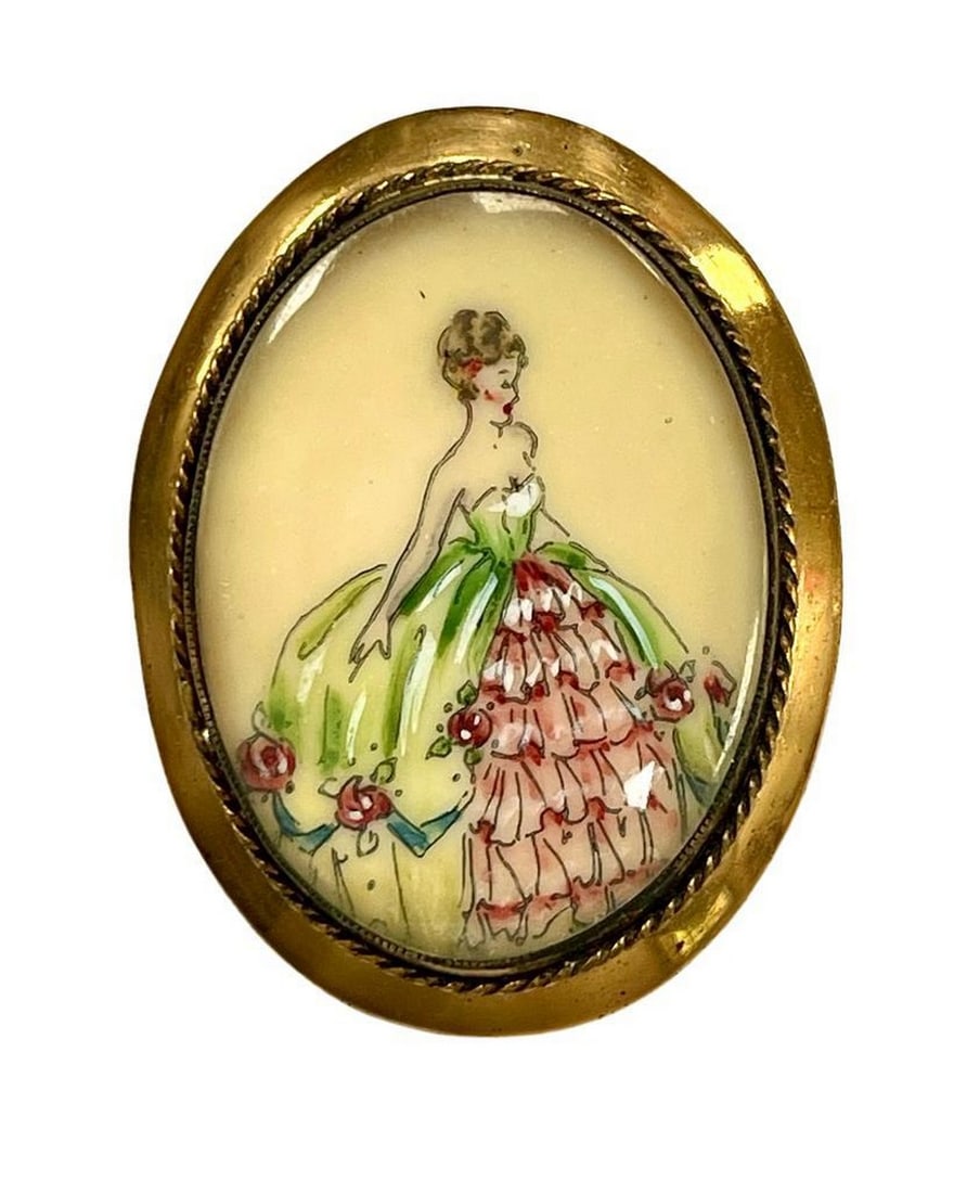 Encapsulated Golden Elegance Lady Brooch: Encapsulated Golden Elegance Lady Brooch The "Golden Elegance Lady Brooch" encapsulates timeless beauty and sophistication within its radiant golden frame, effortlessly elevating any outfit.