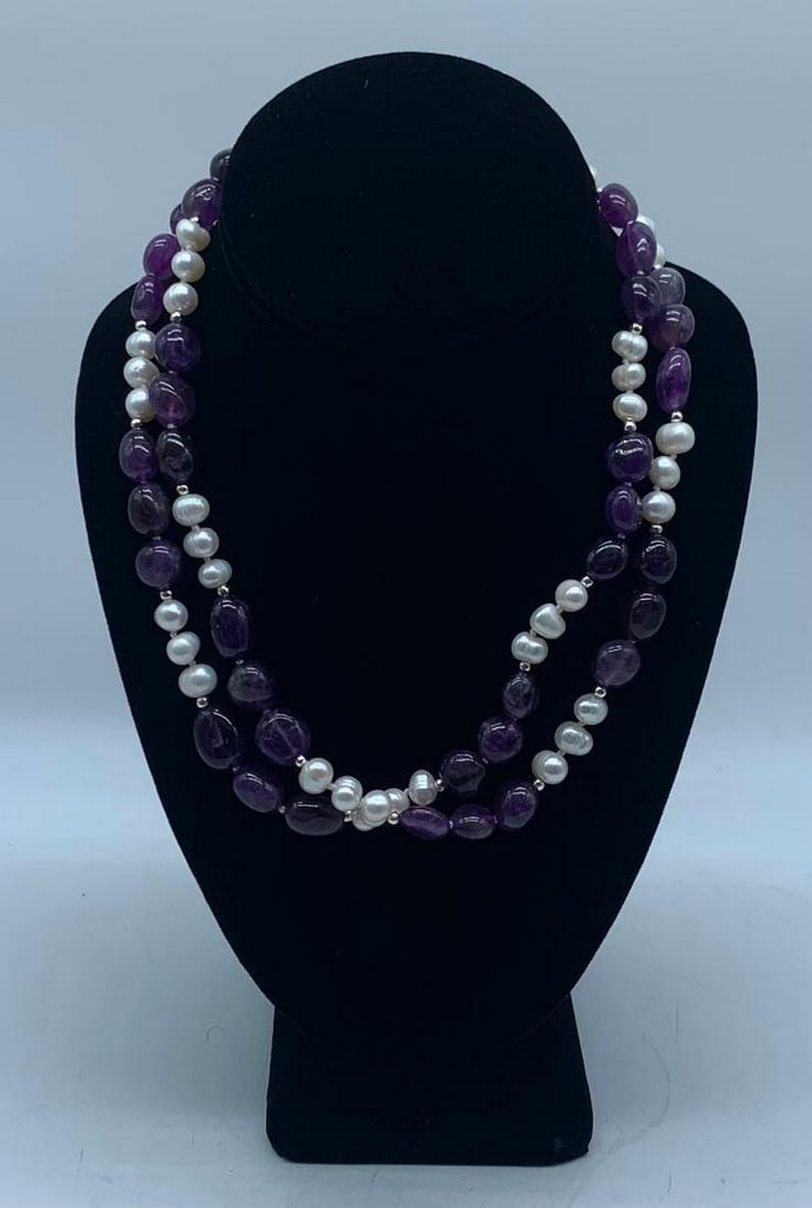 18" Pearl Necklace With Purple Crystals: 18" Pearl Necklace With Purple Crystals Beautiful pearl necklace with purple crystals connecting them in between. Purple crystal meanings are all about spiritual energy. These stones help us