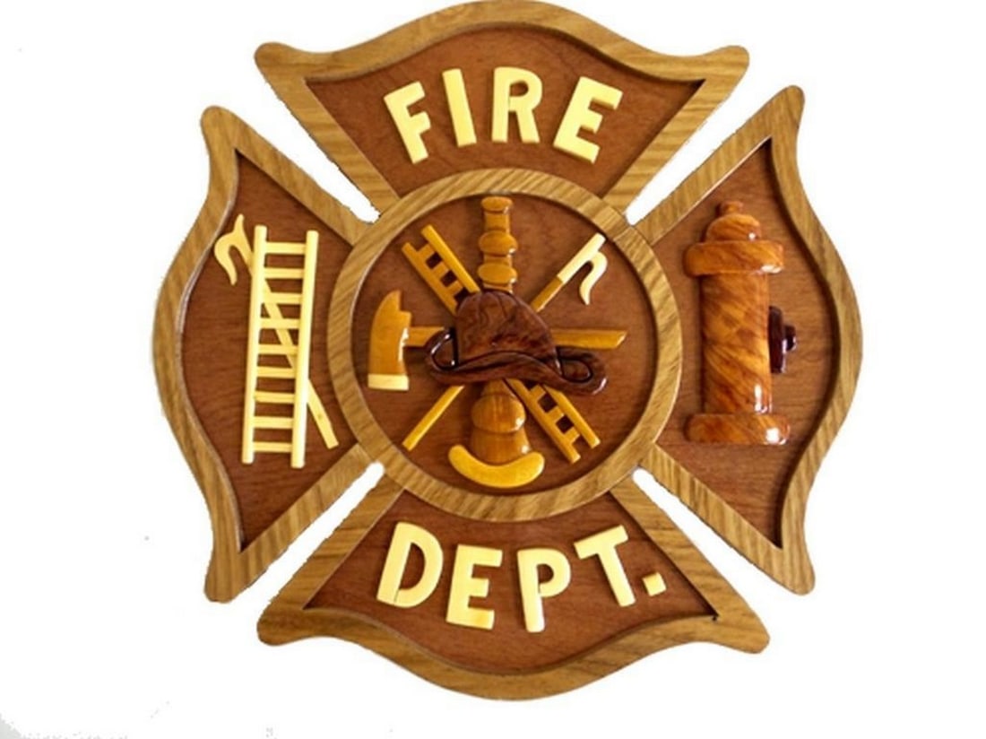 Fire Fighter Wall Plaque: Fire Fighter Wall Plaque This wall plaque features a firefighter-themed design, suitable for display in a home, office, or station setting. The piece presents a straightforward decorative format with