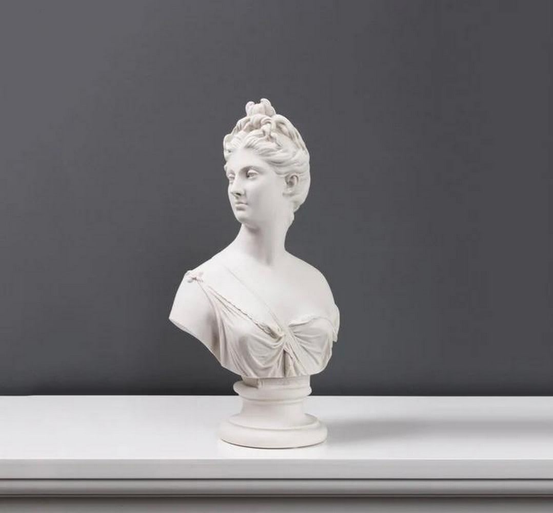 Ethereal Presence: Bust of Diana - (9.2lbs): Ethereal Presence: Bust of Diana - (9.2lbs) This exquisite bust of Diana, the Roman goddess of the hunt and the moon, beautifully captures her elegance and strength. Crafted from fine marble, the scu