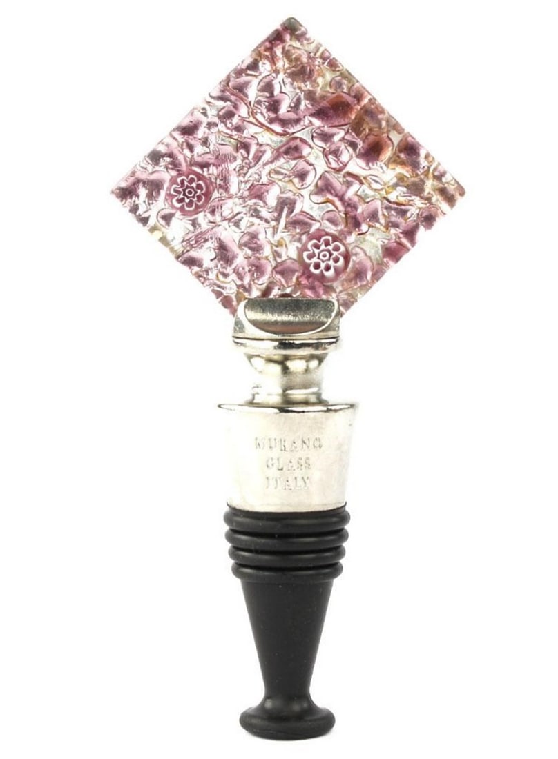 Pink Flowered Cube Shaped Murano Glass Bottle Stopper: Pink Flowered Cube Shaped Murano Glass Bottle Stopper Bottle stopper handmade with the technique of fusing glass in addition of small glass pieces and blue millefiori. This bottle stopper is an perf