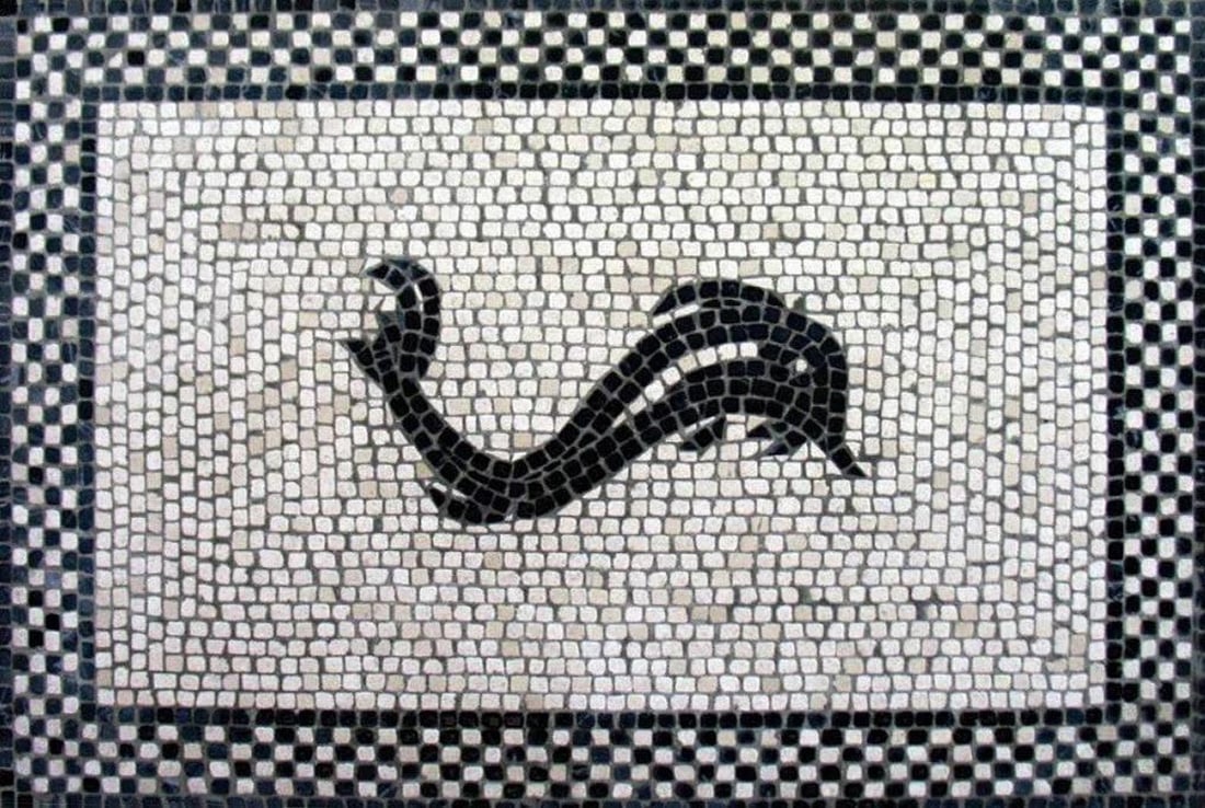 Dolphin Mosaic: Dolphin Mosaic The Dolphin Mosaic illustrates a dolphin with geometric forms on the border in black and white. This masterpiece is an entirely handmade mosaic reproduction created using the techniqu