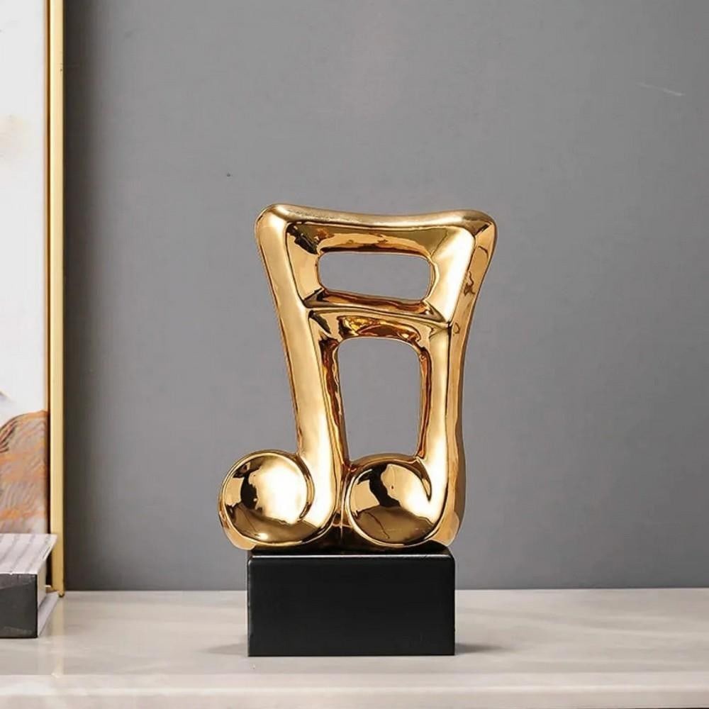 Musical Sculpture – Golden Beam Note: Musical Sculpture – Golden Beam Note Celebrate your love for art and music with the distinctive Golden Beam Note Sculpture. Its elegant, one-of-a-kind design brings a touch of sophistication to any