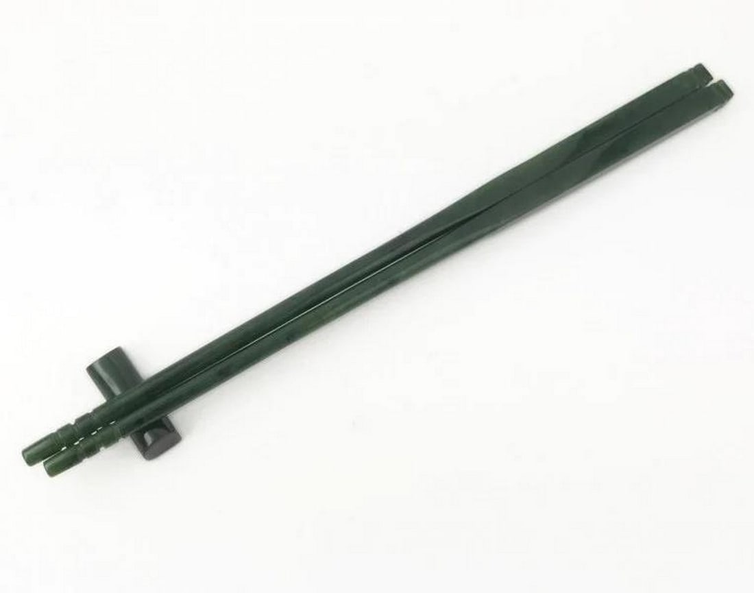 Canadian Nephrite Solid Jade Chopsticks: Canadian Nephrite Solid Jade Chopsticks Includes a set of solid Canadian nephrite jade chopsticks and jade chopstick rest. Chopsticks measure approximately 10" Dimensions: 10" Length View