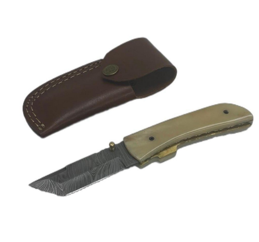 Glinting Silver Folding Damascus Knife: Custom Handmade Damascus Steel Hunting, Camping & Folding Knife Handle Camel bone. Damascus Steel Blade with 256 Layers on it. HARDNESS 56-60 H R C VERY HIGH QUALITY GENUINE LEATHER SHEATH SIZE: O