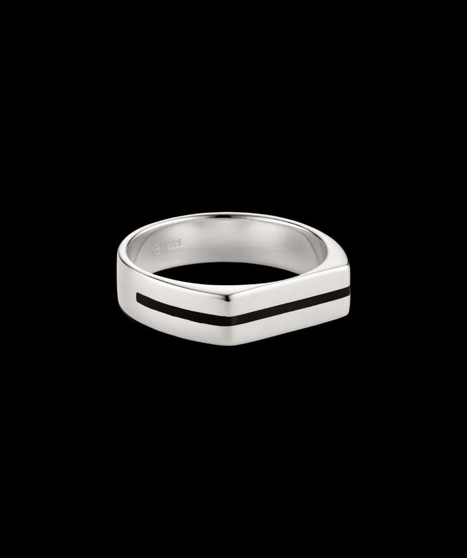 Sterling Silver Black Stripe Band Ring: Sterling Silver Black Stripe Band Ring Minimalism with magnitude. This slim sterling silver band features a bold black enamel stripe, offering sleek contrast without any excess. Hypoallergenic, stron