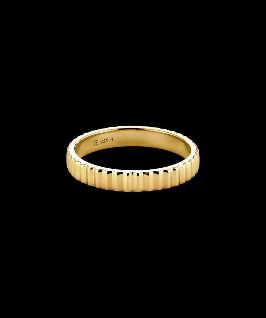18k Gold Vermeil Fluted Eternity Ring: 18k Gold Vermeil Fluted Eternity Ring No beginning, no end—just golden perfection all the way around. The fluted texture catches light from every angle, adding depth and intricate detail. Hypoaller