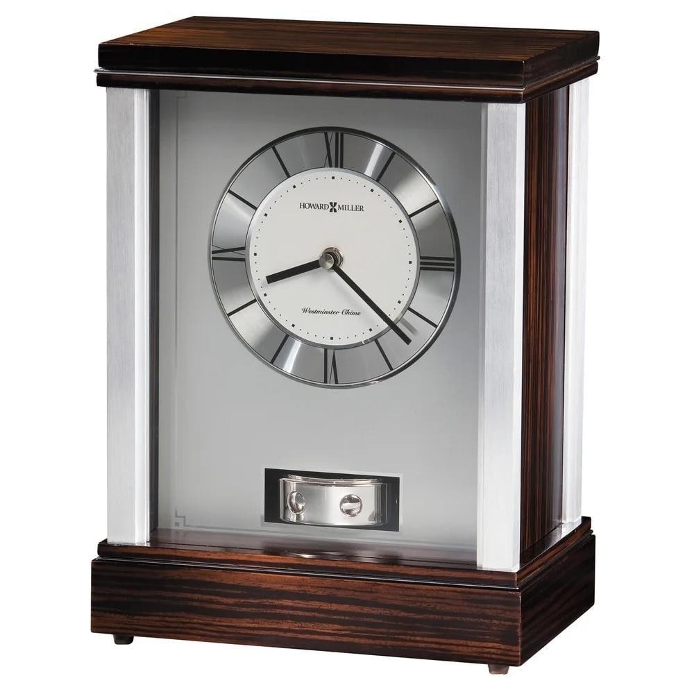 Polished Silver & Macassar Ebony Mantel Clock with Pendulum: Polished Silver & Macassar Ebony Mantel Clock with Pendulum This mantel clock features a faux Macassar Ebony finish with brushed aluminum corners and polished silver-tone accents. The brushed alum