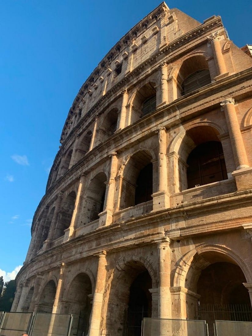 Majesty of Rome: Majesty of Rome Own a timeless piece of history reimagined in art. This lot offers the chance to have this captivating photograph of the Colosseum in Rome hand-painted on canvas by a skilled