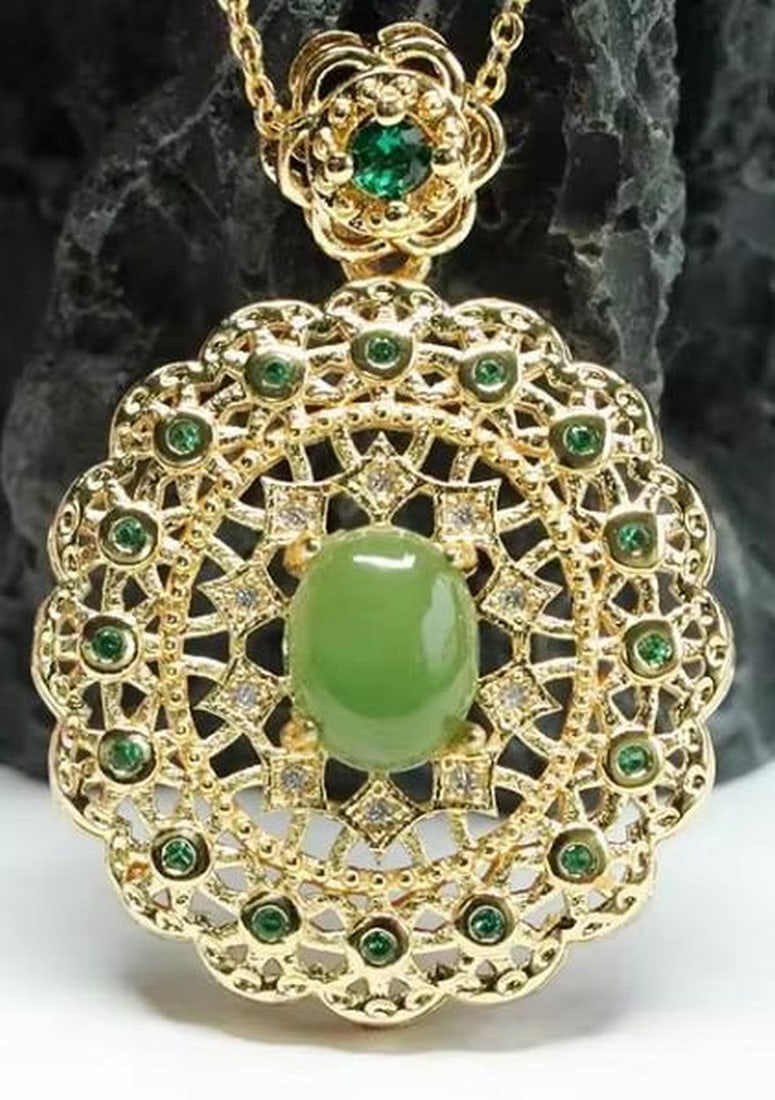 Hollow-Out Flower Jade Pendant: Hollow-Out Flower Jade Pendant Embrace the timeless elegance of this Jade Pendant, a stunning piece that captures the pure beauty and cultural significance of jade. Perfect for those who