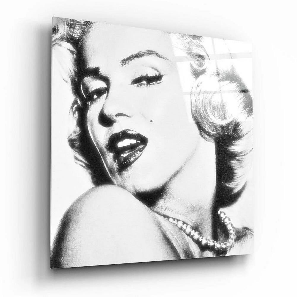 Black & White Marilyn Monroe Glass Wall Art: Black & White Marilyn Monroe Glass Wall Art This tempered glass wall art features a black and white portrait of Marilyn Monroe, emphasizing contrast and tonal depth. The monochrome palette highlig