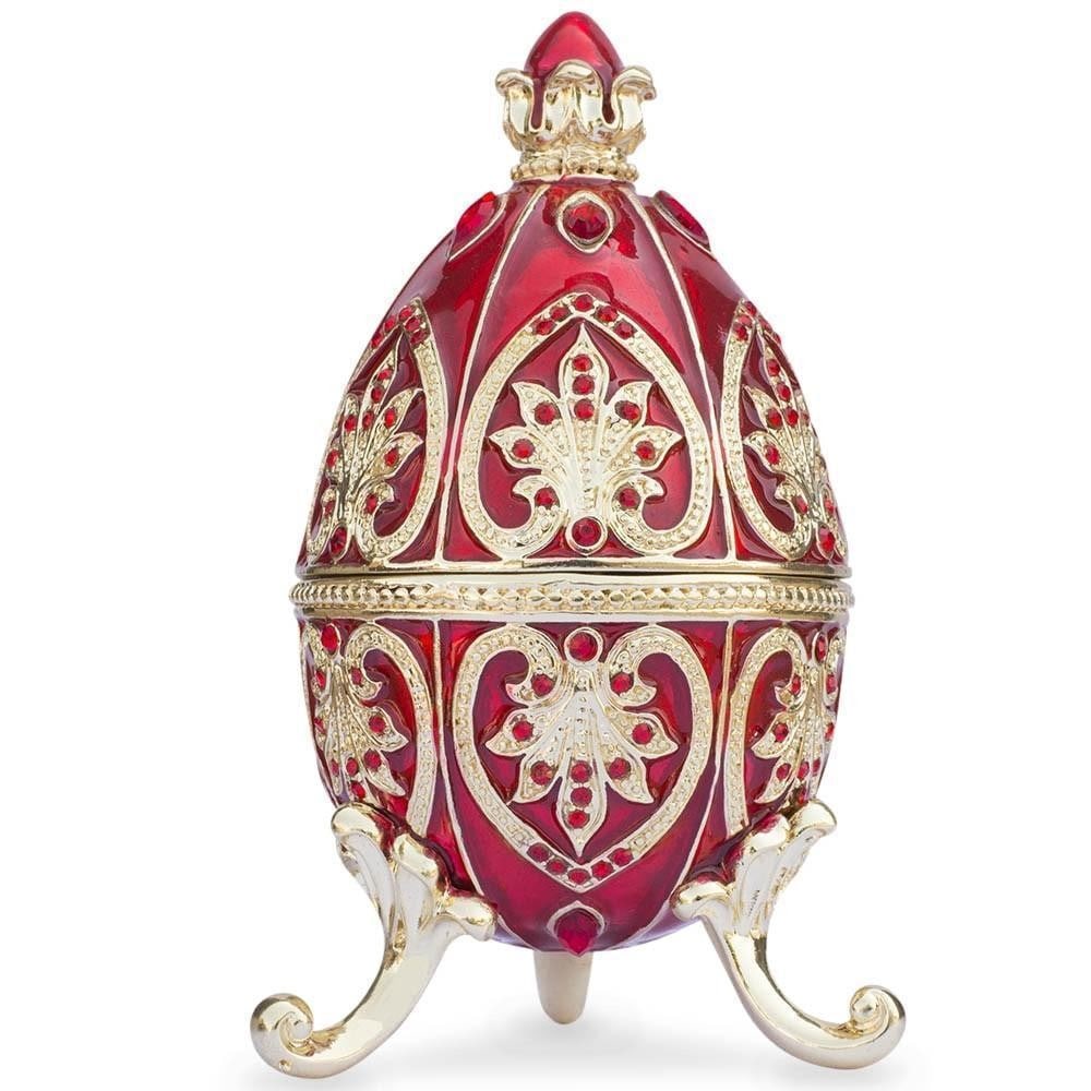 Red Royal Jeweled Crown Royal Inspired Russian Egg: Red Royal Jeweled Crown Royal Inspired Russian Egg You'll love the elegance of this red-hued Royal inspired Russian egg. A display stand attached to this beauty. Fashioned from fine pewter. Then